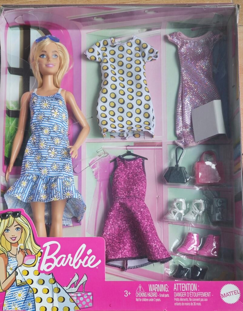 Barbie Doll with 3 Fashion Dresses, Shoes & Handbags – Mattel